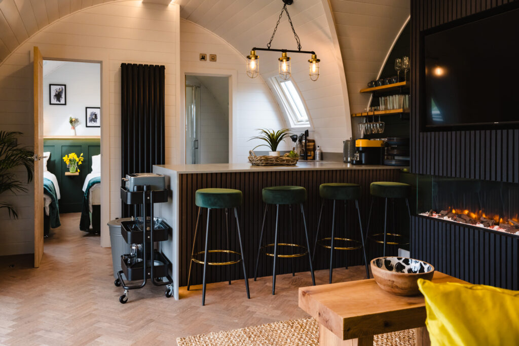 Open-plan interior photography of a luxury holiday lodge in Rutland featuring modern Scandinavian design