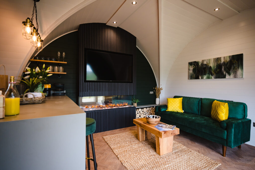 Open-plan interior photography of a luxury holiday lodge in Rutland featuring modern Scandinavian design