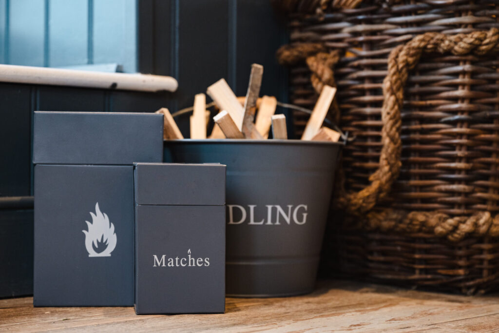 Close-up of firewood and kindling details for a cosy stay at a luxury lodge in Rutland