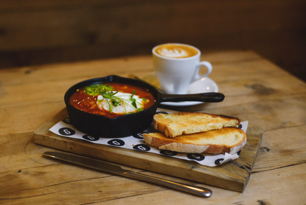 Cosy Lifestyle food photography of shakshuka in a rustic hotel restaurant, East Midlands